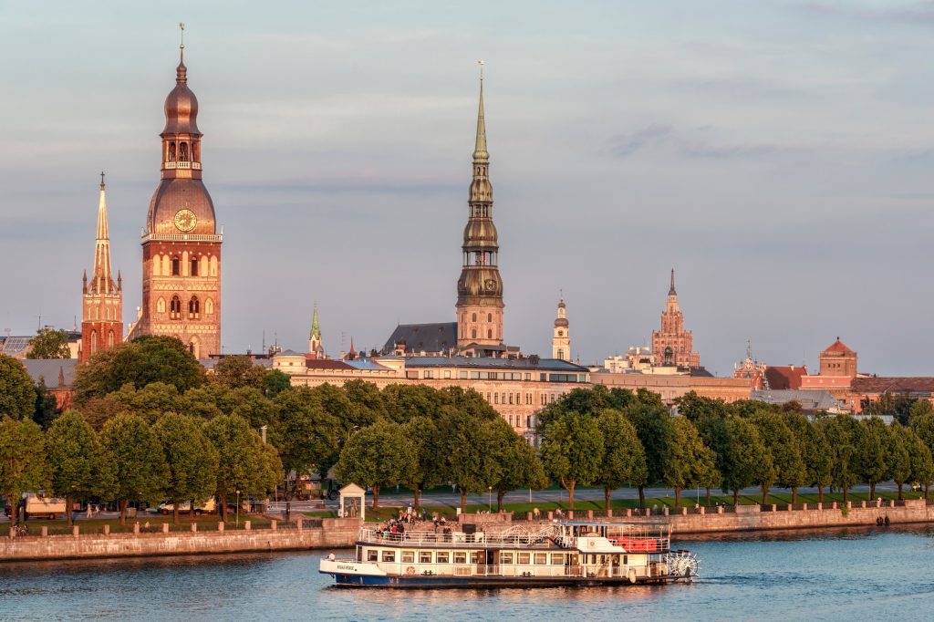 Latvia, Riga, cityscape with Daugava River, churches and Academy of sciences